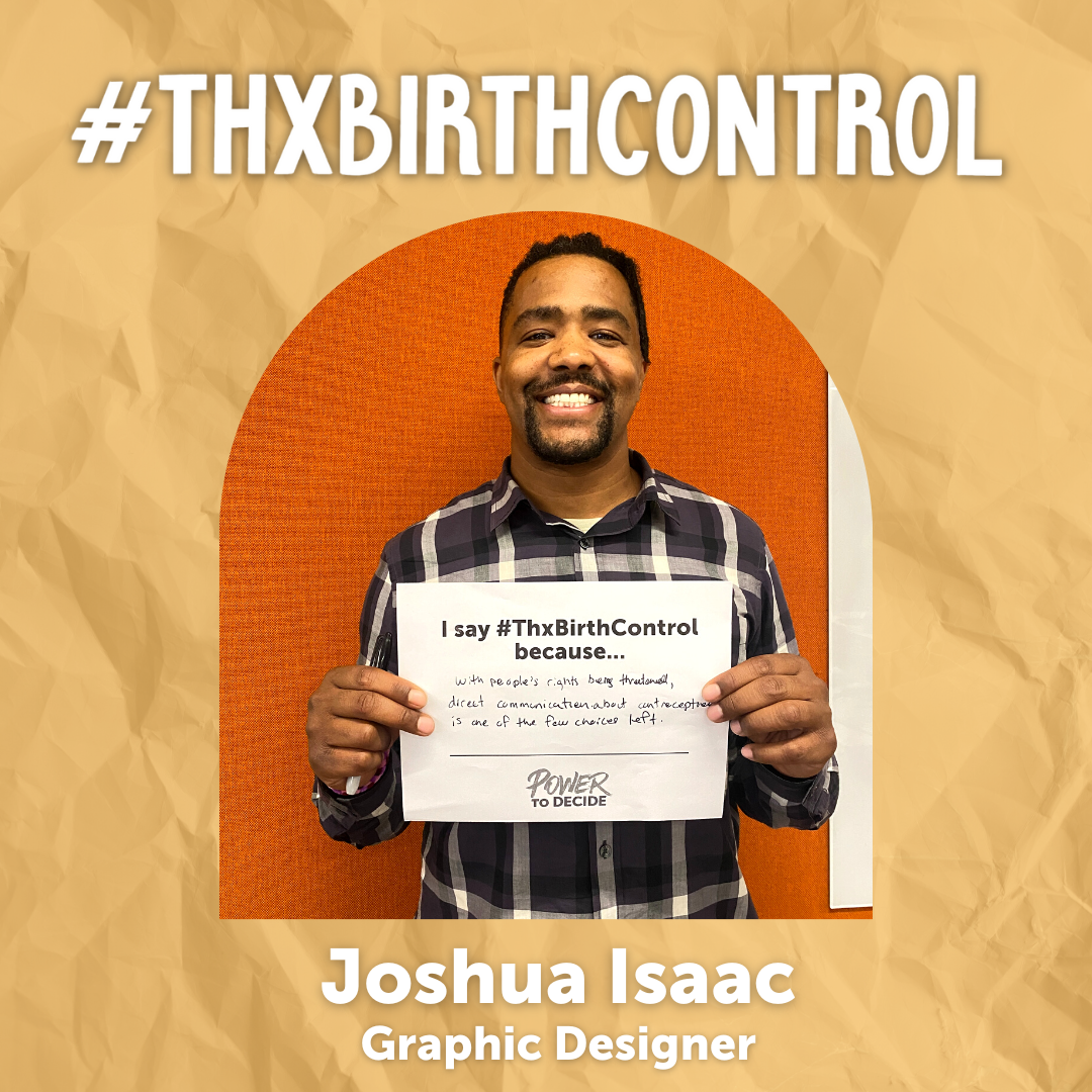 A Power to Decide Staffer holds a sign with their reason for saying #ThxBirthControl.