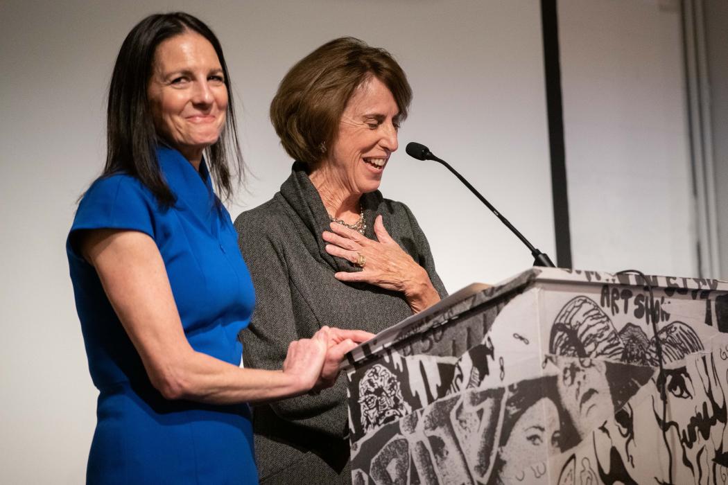A speaker at a podium