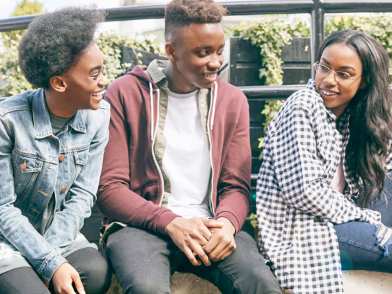 Three black teens hang out