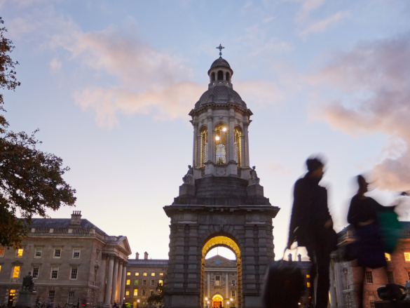 A shot of a college campus entry gate at twilight. 