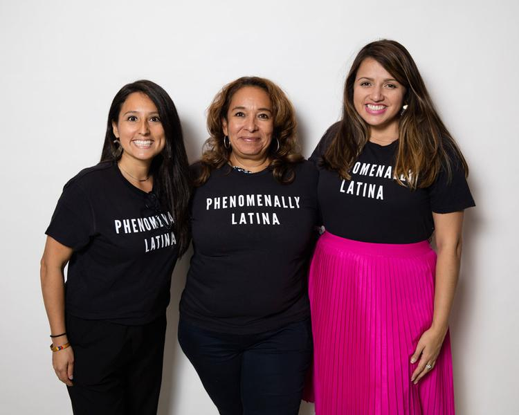 Three Latina women in shirts that read, "Phenomenally Latina"